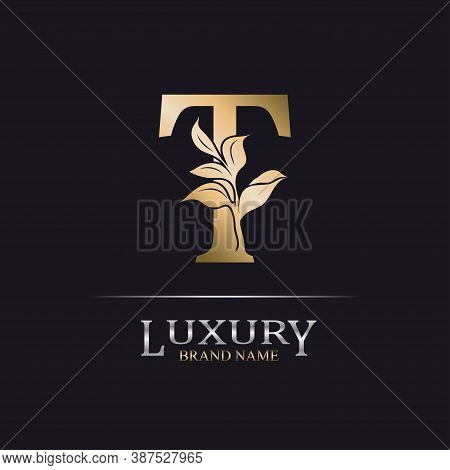 Golden Initial Letter T. Elegant Design Letter T With Floral Branch. Luxury Gold Logo Icon. Vintage 