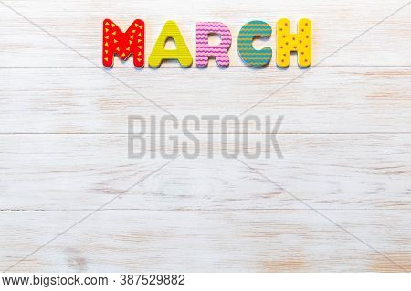 Wooden Letters Written March Month On Vintage Background. Inscription March With Copy Space. Top Vie