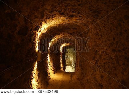 Light At The End Of The Tunnel Inside The Medieval Cave City Of Vardzia On Erusheti Mountain Near As