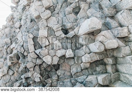 Natural Stone Texture. Basalt Lava Formations Like Columns. Icelandic Typical Natural Background. Vo