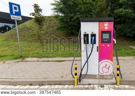 Katowice, Poland 18.07.2020 - Power Supply For Electric Car Charging. Pink Electric Car Charging Sta