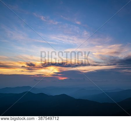 Summer Misty Evening Mountain Tops Silhouettes. Marmaros, Carpathian, Ukraine.
