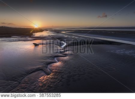 Sunset Over The Loughor Estuary, South Wales.