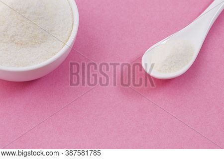 Hydrolysed Powder Collagen - Pink Background. Text Space