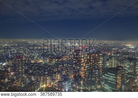 Night Cityscape View Againts Sky At Night Time