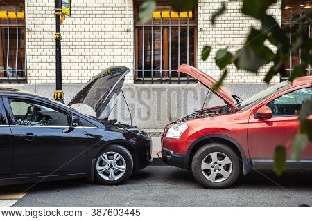 Cars With Open Bonnets. Start The Engine With A Battery