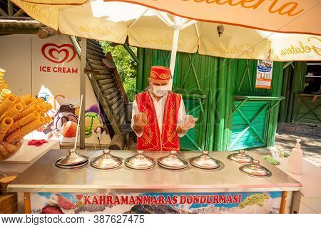 Antalya, Turkey - 4.09.2020: Traditional Turkish Ice Cream Seller In A Summer Day, Antalya, Turkey