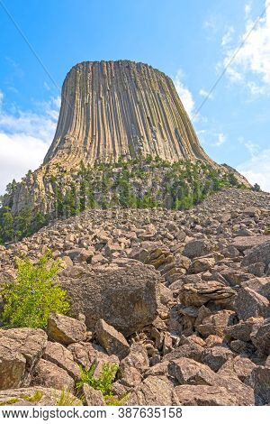 Looking Up A Boulder Field To A Monolith At Devils Tower National Monument In Wyoming