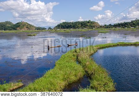 Moirang Manipur India On November 3rd 2018: Two Fishermen Are Sailing Through The Beautiful Loktak L