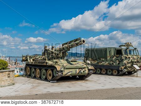 Seosan, South Korea; September 13, 202: Eight Inch Self-propelled Gun Beside M548 Tracked Cargo Carr