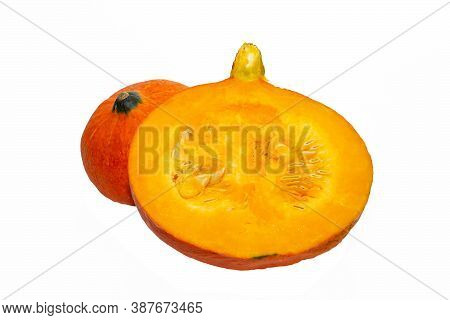 Ripe Orange Pumpkin And Slices Isolated On A White Background. Half Ripe Orange Pumpkin Isolated On 