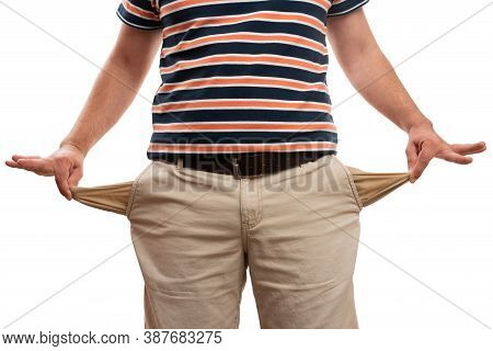 Adult Man Model Wearing Casual Summer Clothing Showing Inside Of Trousers Or Pants Pockets As Moneyl
