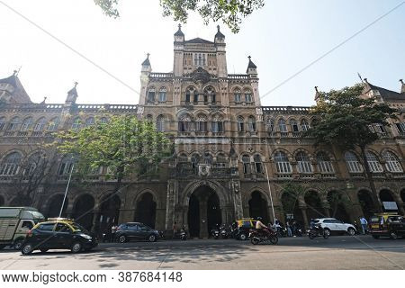 MUMBAI, INDIA - FEBRUARY 15, 2020: MUMBAI, INDIA - FEBRUARY 14, 2020: Colonial-era Elphinstone College in Mahatma Gandhi Road, Kala Ghoda, Fort, Mumbai, India