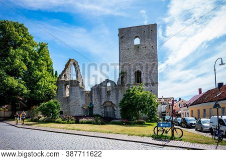 Visby, Sweden - July 27, 2020: Beautiful Summer City View Of An Old Ancient Church Ruin With Inciden