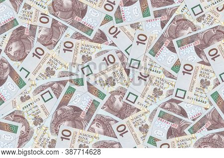 10 Polish Zloty Bills Lies In Big Pile. Rich Life Conceptual Background