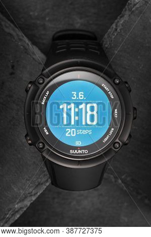 Smart Gps Suunto Watch For Sports And Adventure On Slate Background. Smartwatch With Digital Screen.