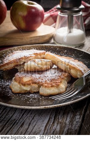 Sweet Pancakes Made Of Apple, Milk And Flour.