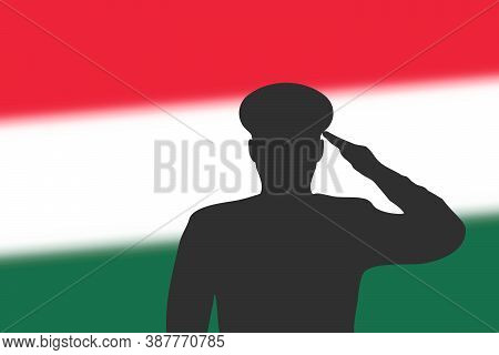 Solder Silhouette On Blur Background With Hungary Flag.