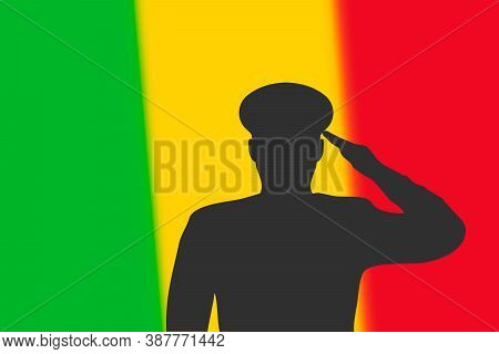Solder Silhouette On Blur Background With Mali Flag.