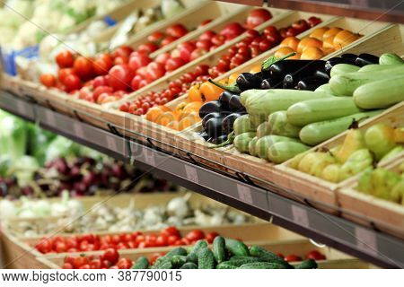 The Grocery Store Sells Various Vegetables, Tomatoes, Cucumbers, Eggplants, Peppers, Zucchini. Veget