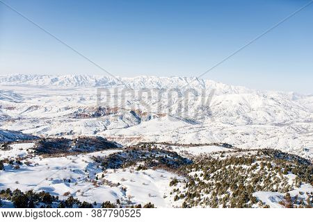 Beautiful Panorama Of The Tien Shan Mountains In Uzbekistan In The Beldersay Ski Resort On A Clear W