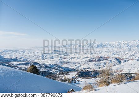 Picturesque Tien Shan Mountains In Uzbekistan, Covered With Snow, Winter Clear Sunny Day In The Moun