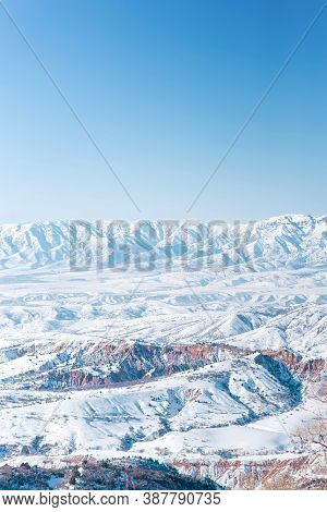 The Tien Shan Mountain Range In Winter. The View From The Pass Beldersay Uzbekistan