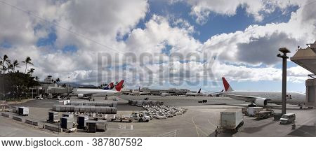 Honolulu - November 30, 2011: Hawaiian Airlines And Jal Planes Parked At Honolulu International Airp