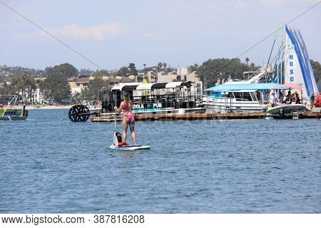 Man Flying Flyboarding On A Flyboard - Hydroflighting Device Which Supplies Propulsion To Drive The 