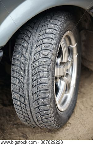 Used Winter Tire With Metal Studs Closeup, Some Studs Lost. Protector For Winter Studded Tire. Lost 
