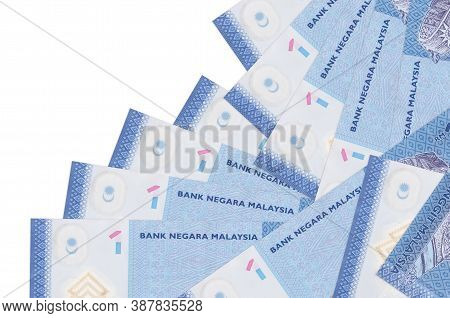1 Malaysian Ringgit Bills Lies In Different Order Isolated On White. Local Banking Or Money Making C