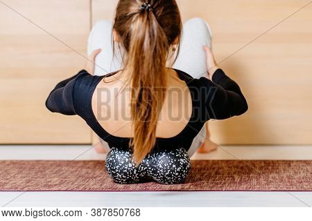 Woman Holding Massage Percussion Duoball For Muscle Soreness After Fitness Exercise, Muscle Strain A