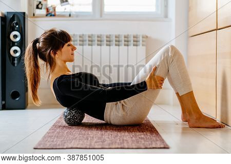 Woman Holding Massage Percussion Device Ideal For Muscle Soreness After Fitness Exercise, Muscle Str