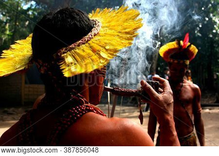 Porto Seguro, Bahia / Brazil - April 13, 2006: Pataxo Indians Are Seen In The Jaqueira Village In Th