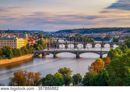 Vltava River With Historic Bridges Of Prague At The Golden Hour Photographed From Letna Park. Long E