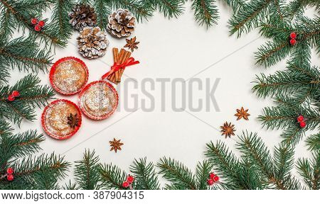 Christmas Composition Pastries, Cinnamon, Pine Cones On The Table,gold Ornaments On Fir Branches, Gi