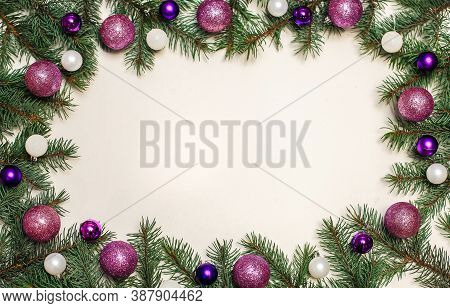 Christmas Composition. Gifts, Fir Branches And Ornaments Balls On A White Surface, Top View. New Yea