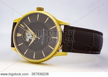 Geneve, Switzerland 01.10.2020 - Claude Bernard Man Swiss Made Mechanical Watch Gold Pvd Coating Bei