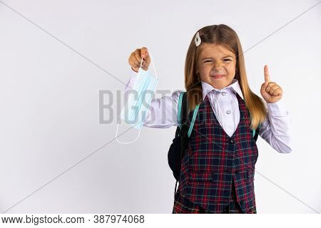 Photo Of Little Student School Girl Clothing School Dislike Epidemic Rules Dont Want Wear Facial Mas