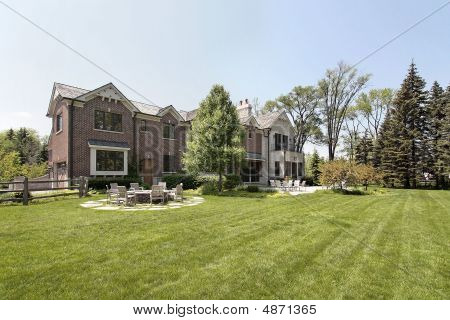 Large Brick Home And Back Yard