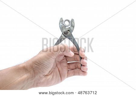 Hand With Pilers Isolated On White Backround