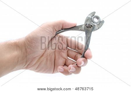 Hand With Pilers Isolated On White Backround