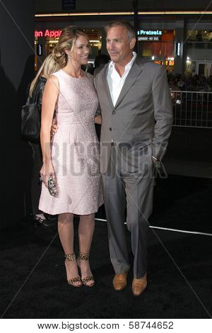 LOS ANGELES - JAN 15:  Christine Baumgartner, Kevin Costner at the 