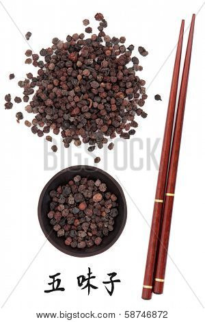 Schisandra berries chinese herbal medicine with chopsticks and mandarin script title translation. Wu wei zi.