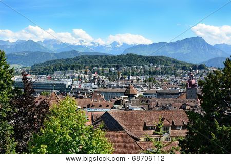LUCERN, SWITZERLAND - JULY 3, 2014: Overview of Lucern, Switzerland. From the Musegg Wall you get a beautiful vista of the city including churches, and other public buildings.