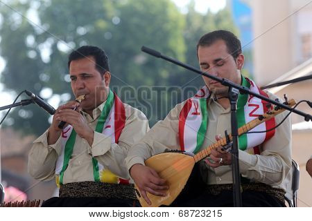 ZAGREB, CROATIA - JULY 18: Members of folk group Payiz from Sulaimaniya, Kurdistan, Iraq during the 48th International Folklore Festival in center of Zagreb, Croatia on July 18, 2014