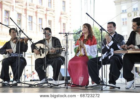 ZAGREB, CROATIA - JULY 18: Members of folk group Payiz from Sulaimaniya, Kurdistan, Iraq during the 48th International Folklore Festival in center of Zagreb, Croatia on July 18, 2014