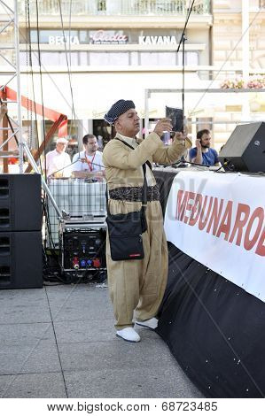 ZAGREB, CROATIA - JULY 18: Members of folk group Payiz from Sulaimaniya, Kurdistan, Iraq during the 48th International Folklore Festival in center of Zagreb, Croatia on July 18, 2014