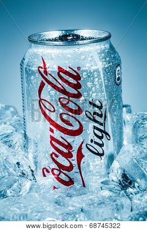 MOSCOW, RUSSIA-APRIL 4, 2014: Can of Coca-Cola Lignt on ice. Coca-Cola is a carbonated soft drink sold in stores, restaurants, and vending machines throughout the world.