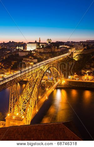 Dom Luiz bridge in Porto Portugal at dusk
